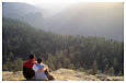 couple looking out at Yosemite Valley